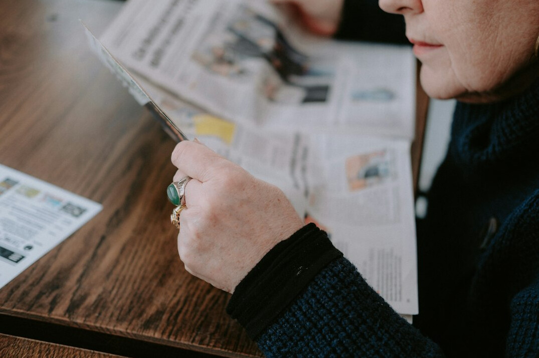 investigative journalist reviewing documents