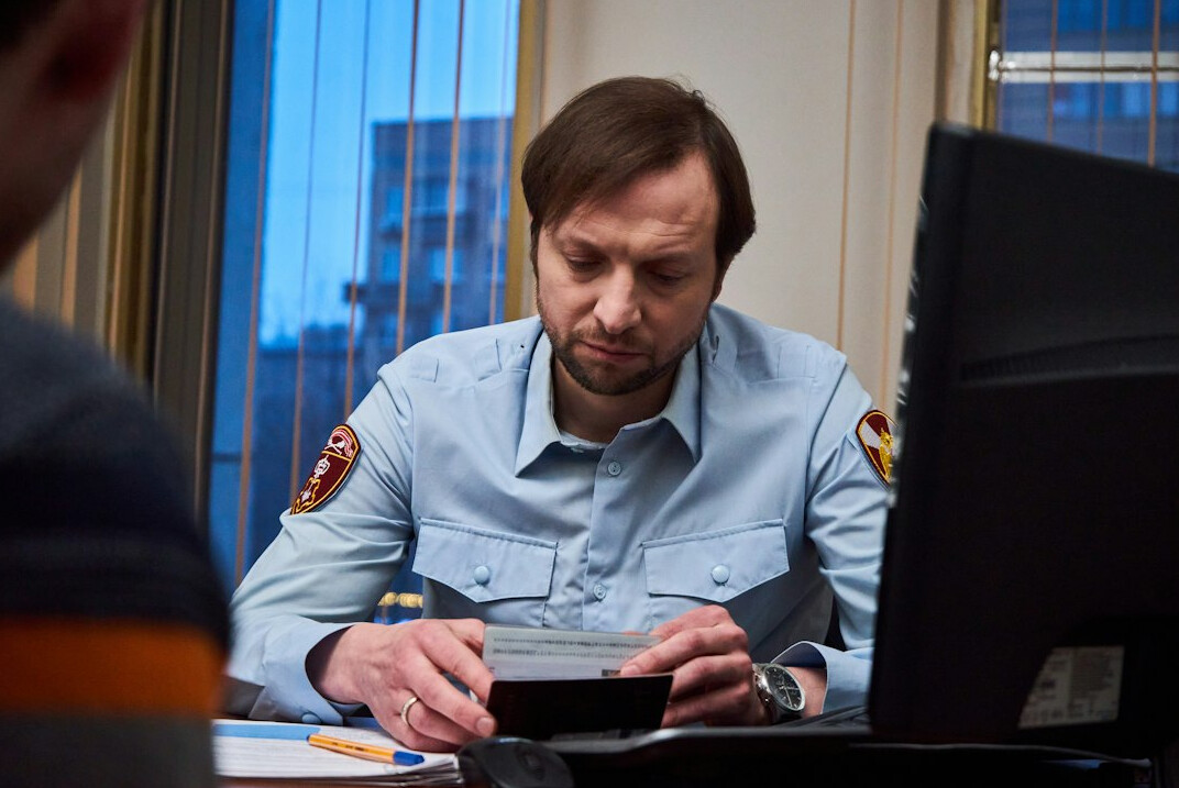 investigators examining documents